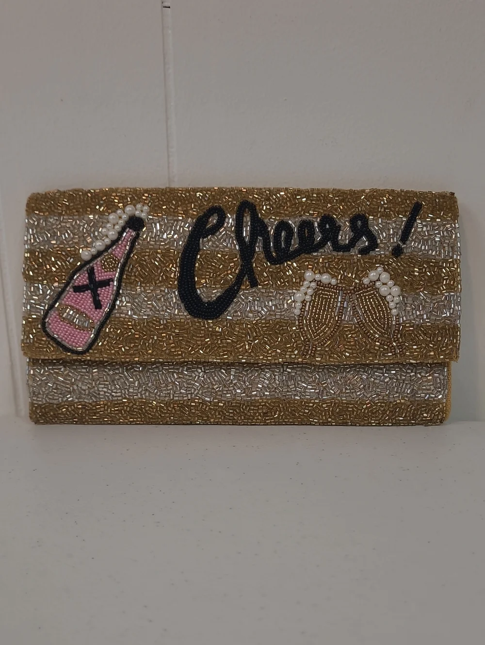 Beaded 'Cheers' Gold and Silver Party Clutch with Pink Bottle and Pearl Accents